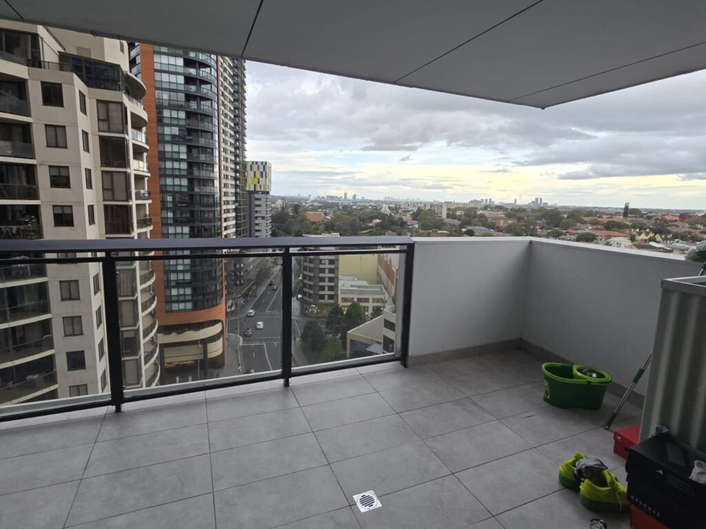 Balcony with city skyline views at Stay Spot shared accommodation, 9 Hassall Street, Parramatta